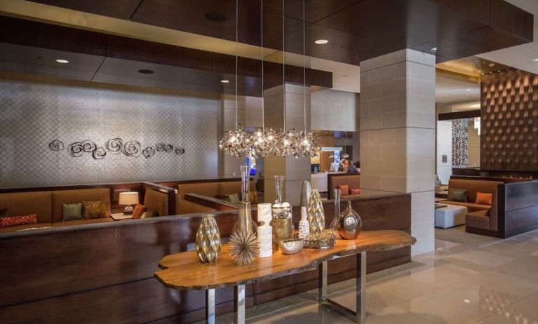 Lobby and coworking lounge at Hilton Dallas/ Plano Granite Park.