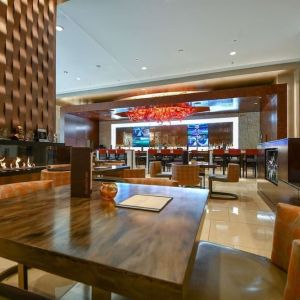 Dining area perfect for coworking at Hilton Dallas/ Plano Granite Park.