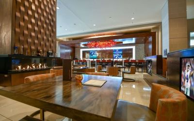Dining area perfect for coworking at Hilton Dallas/ Plano Granite Park.