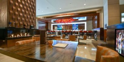 Dining area perfect for coworking at Hilton Dallas/ Plano Granite Park.