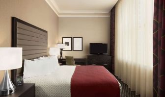 Day use room with work desk and natural light at Embassy Suites By Hilton St. Louis Downtown.
