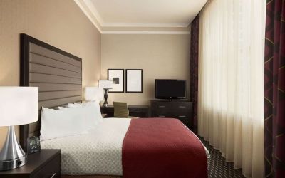 Day use room with work desk and natural light at Embassy Suites By Hilton St. Louis Downtown.