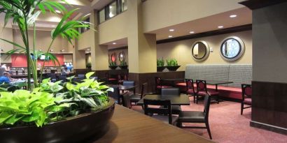 Dining area perfect for coworking at Embassy Suites By Hilton St. Louis Downtown.
