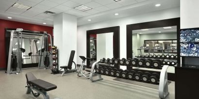 Fitness center at Embassy Suites By Hilton St. Louis Downtown.
