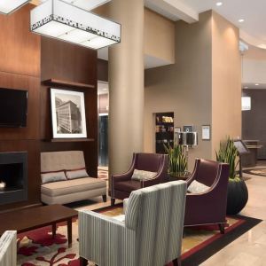 Lobby and coworking lounge at Embassy Suites By Hilton St. Louis Downtown.
