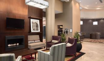 Lobby and coworking lounge at Embassy Suites By Hilton St. Louis Downtown.