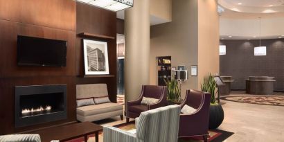 Lobby and coworking lounge at Embassy Suites By Hilton St. Louis Downtown.