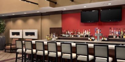 Hotel bar at Embassy Suites By Hilton St. Louis Downtown.