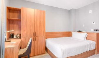 Day use room with work desk and natural light at Liberty View Brooklyn Hotel.