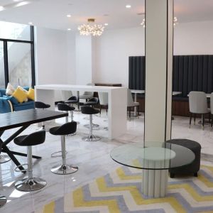 Lobby and coworking lounge at Liberty View Brooklyn Hotel.