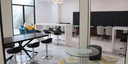 Lobby and coworking lounge at Liberty View Brooklyn Hotel.
