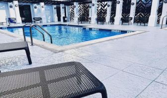 Refreshing outdoor pool at The Chifley Houston, Tapestry Collection By Hilton.