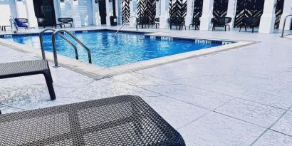 Refreshing outdoor pool at The Chifley Houston, Tapestry Collection By Hilton.