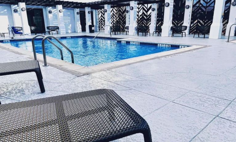 Refreshing outdoor pool at The Chifley Houston, Tapestry Collection By Hilton.