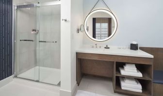 Guest bathroom with shower at The Chifley Houston, Tapestry Collection By Hilton.