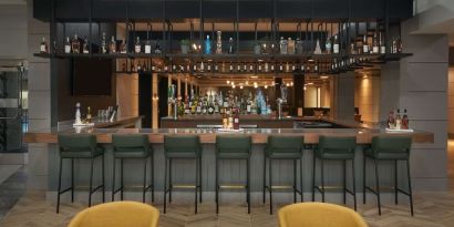 Hotel bar at The Chifley Houston, Tapestry Collection By Hilton.