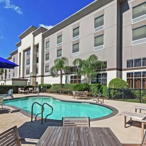 Outdoor pool at Hampton Inn & Suites Houston-Bush Intercontinental Aprt.