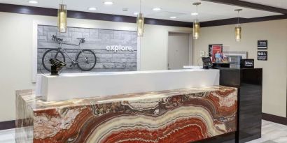 Reception desk at Hampton Inn & Suites Houston-Bush Intercontinental Aprt.