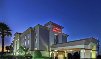 Hotel exterior at night at Hampton Inn & Suites Houston-Bush Intercontinental Aprt.