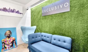 Lobby seating at Exclusivo Inn & Suites. 