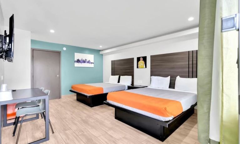 Day use room with TV at Exclusivo Inn & Suites. 