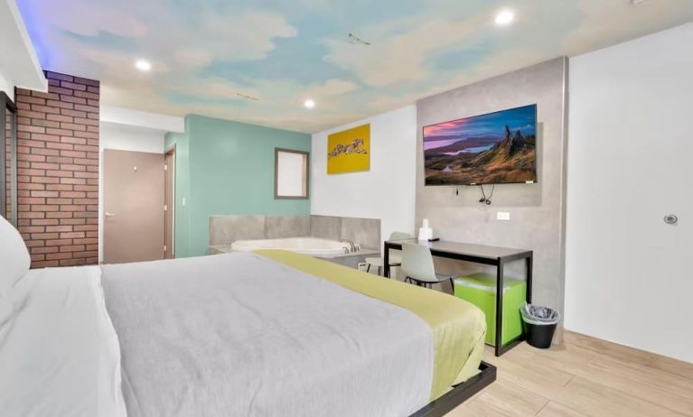 Day use room with TV at Exclusivo Inn & Suites. 