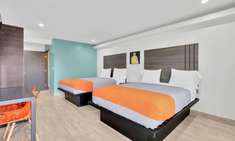 Day use room with TV at Exclusivo Inn & Suites. 