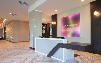 Reception desk at Homewood Suites By Hilton Los Angeles International Airport.