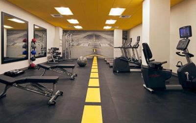 Fitness center at Homewood Suites By Hilton Los Angeles International Airport.