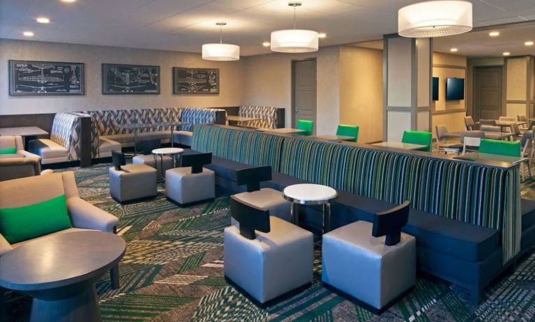 Coworking lounge at Homewood Suites By Hilton Los Angeles International Airport.