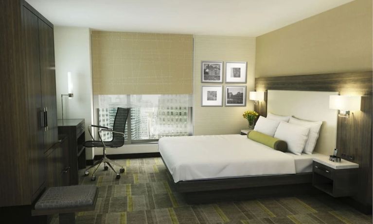Bright and spacious day use room with work desk at Hilton Garden Inn New York/Times Square Central.