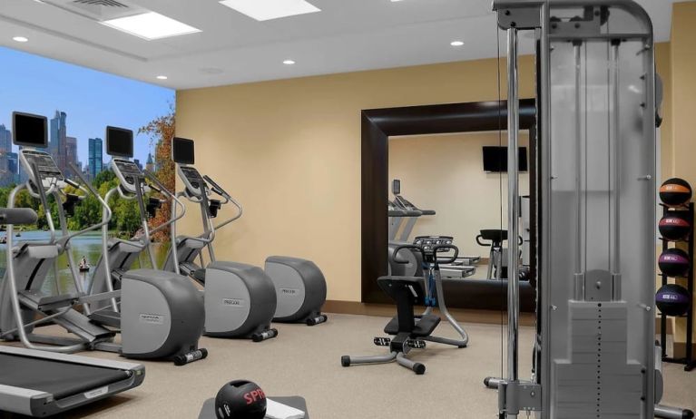 Fully equipped fitness center at Hilton Garden Inn New York/Times Square Central.