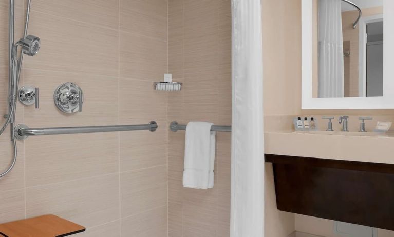 Private guest bathroom with shower at Hilton Garden Inn New York/Times Square Central