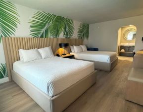 Day room with queen beds at The Harrison Hotel Downtown Hollywood.