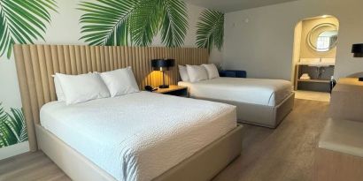 Day room with queen beds at The Harrison Hotel Downtown Hollywood.