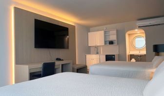 Day room with queen beds at The Harrison Hotel Downtown Hollywood.