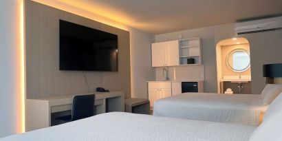 Day room with queen beds at The Harrison Hotel Downtown Hollywood.