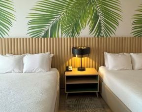 Day room with queen beds at The Harrison Hotel Downtown Hollywood.