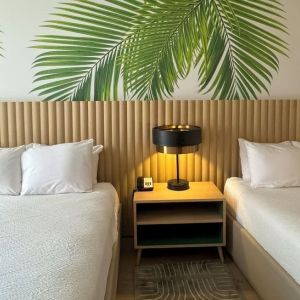 Day room with queen beds at The Harrison Hotel Downtown Hollywood.