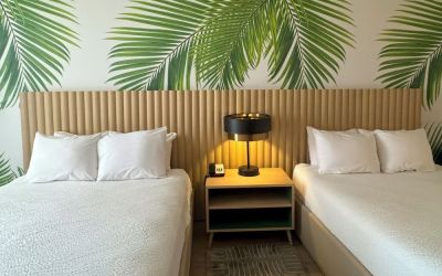Day room with queen beds at The Harrison Hotel Downtown Hollywood.