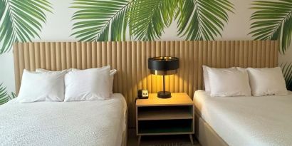 Day room with queen beds at The Harrison Hotel Downtown Hollywood.