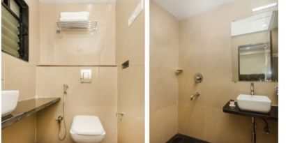 Guest bathroom with shower at THE BEST HOTEL MUMBAI.