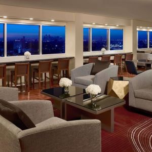 Lobby lounge area and workspace at Royal Sonesta Houston Galleria.