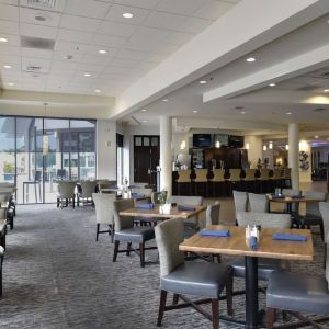 Dining area with comfortable seating at Hotel Tampa Riverwalk.