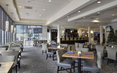 Dining area with comfortable seating at Hotel Tampa Riverwalk.