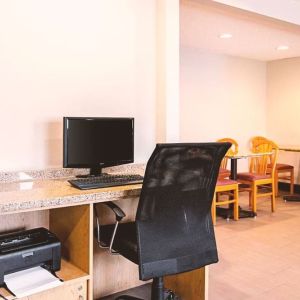 Business center with computer, printer and ergonomic chair at Hotel Inn Milwaukee.
