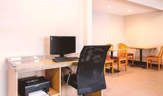 Business center with computer, printer and ergonomic chair at Hotel Inn Milwaukee.