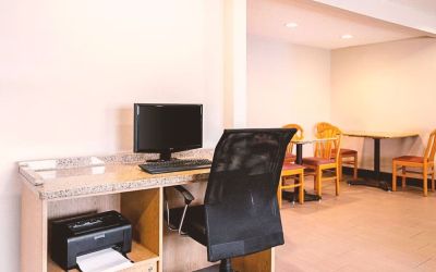 Business center with computer, printer and ergonomic chair at Hotel Inn Milwaukee.
