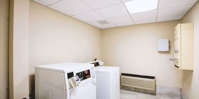 Laundry service available for guests at Hotel Inn Milwaukee.