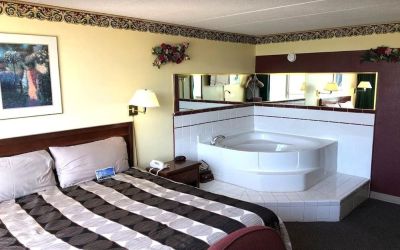 King suite with hot tub at Norwood Inn And Suites Worthington.